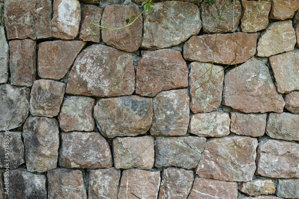 The texture of the stone fence under the rock The texture of the stone fence under the rock