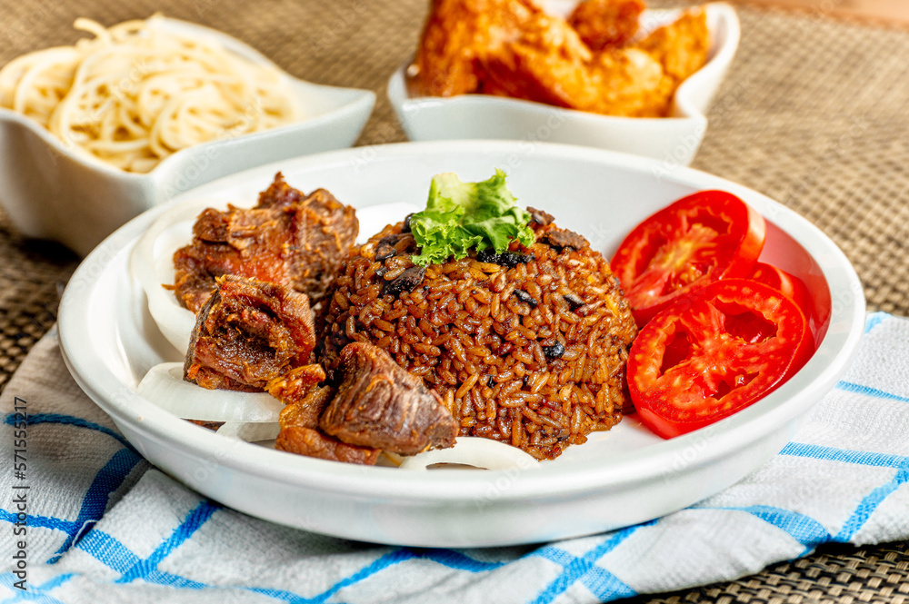 jollof with red chili paste and chicken and meat jollof with red chili paste and chicken and meat