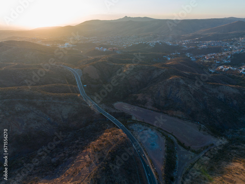 A beautiful aerial view of the endless mountains around the Mexican city of Guanajuato at sunset.