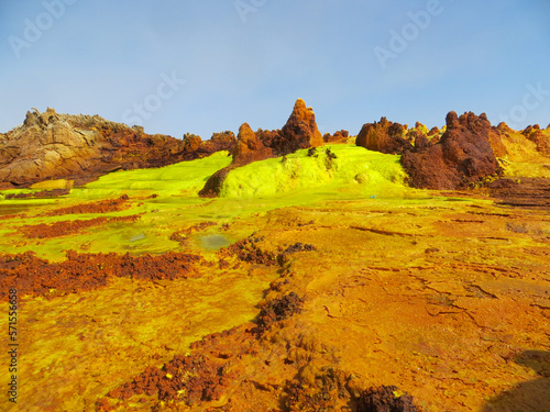 Surreal red green and yellow mineral formation at Danakil Depression with strong colours in Ethiopia, Africa; looking like planet Mars photo