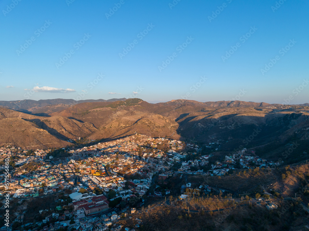 A beautiful aerial view of the endless mountains around the Mexican city of Guanajuato at sunset.