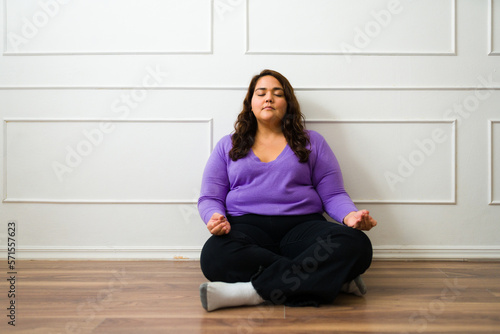 Hispanic big woman doing a meditation