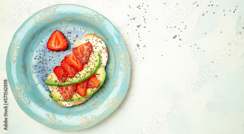 Bruschetta with strawberry and cream cheese ricotta on a light background. banner menu recipe place for text