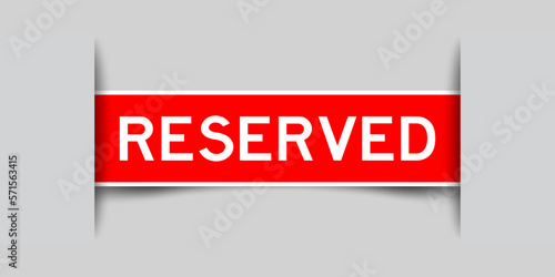 Red color square label sticker with word reserved that inserted in gray background