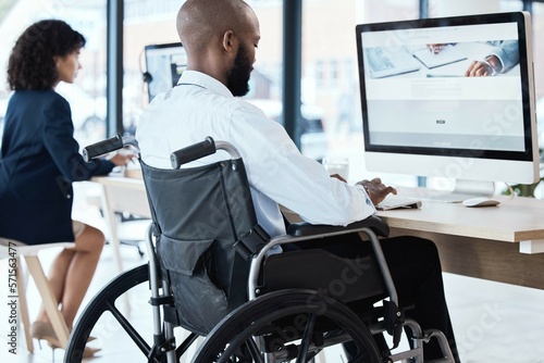 Obraz na płótnie Wheelchair, office and black man disability in the workplace doing business analyst work