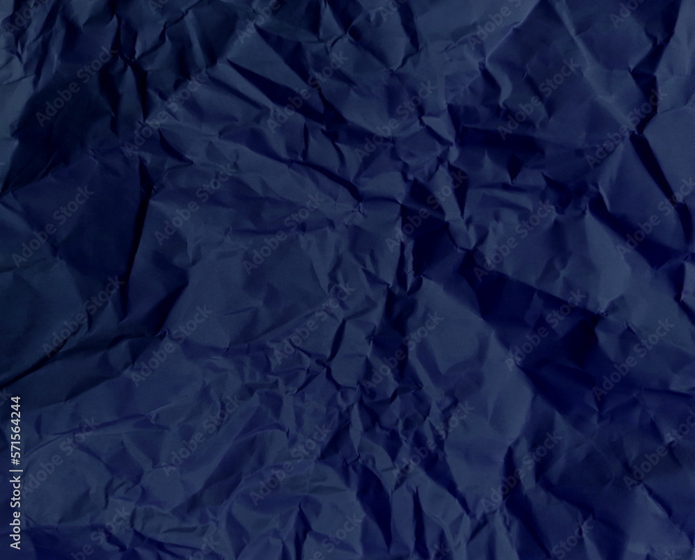 Realistic and crumpled blue paper texture or blue canvas or a blue paper surface, blue crumpled fabric stain texture with various griany stains. Realistic and crumpled blue paper texture or blue canvas or a blue paper surface, blue crumpled fabric stain texture with various griany stains.