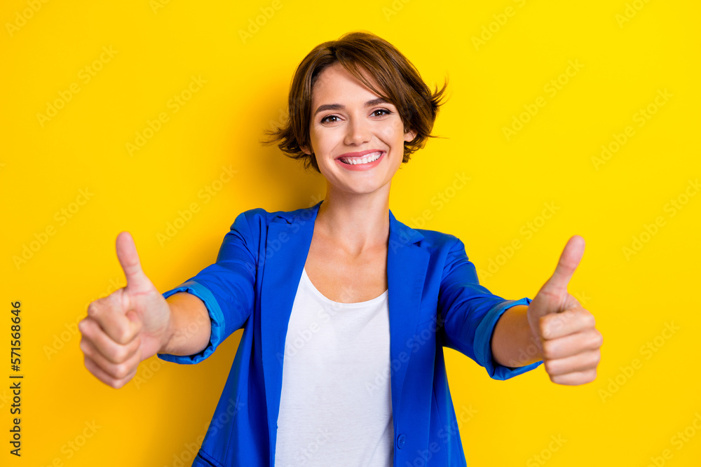 Photo of cheerful hr manager girl wear blue blazer double thumbs up like you select best option candidate isolated on yellow color background - obrazy, fototapety, plakaty 