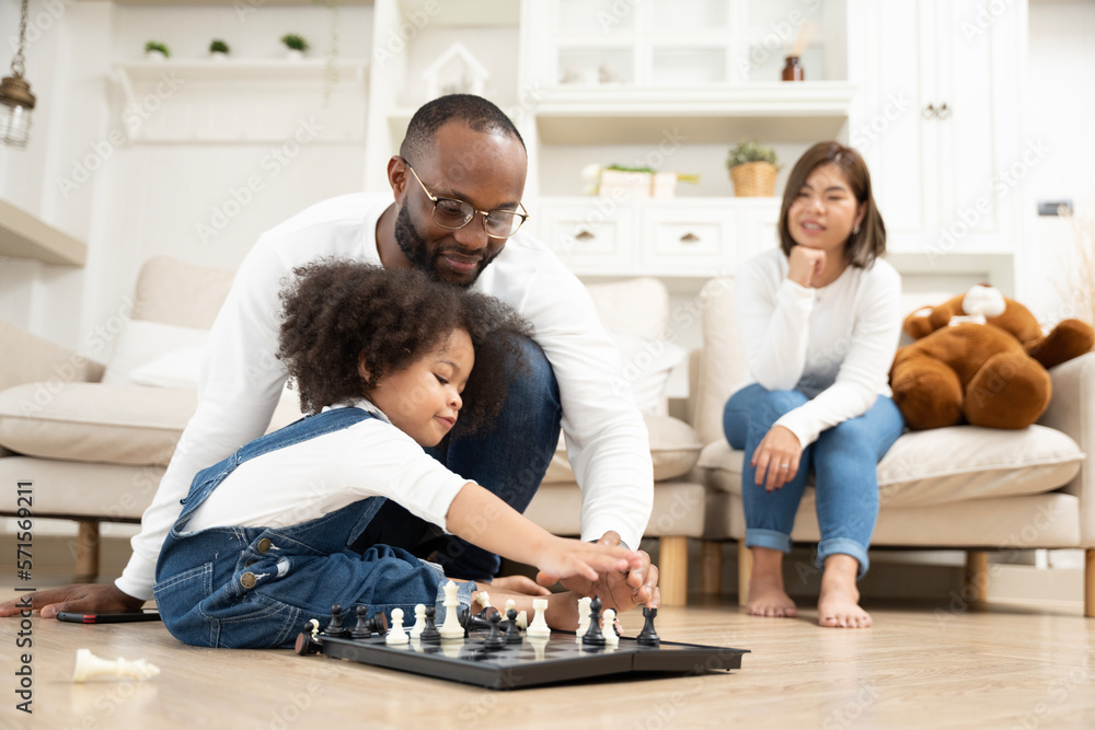 African family, father, mother, daughter doing various activities together on holiday or family day in house or neighborhood, happily. African family, father, mother, daughter doing various activities together on holiday or family day in house or neighborhood, happily.