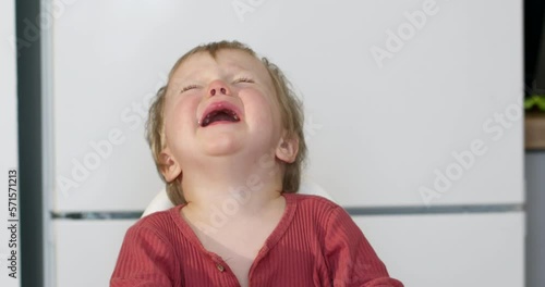 Portrait of a sobbing child, childish tantrum, bad mood