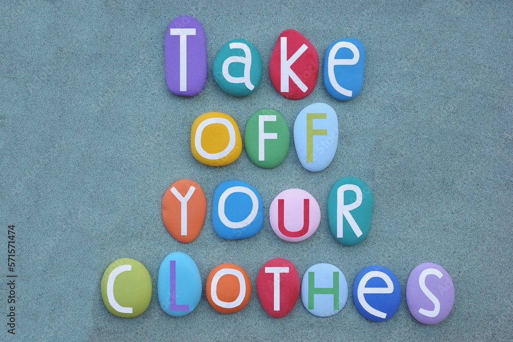 Obraz premium Take me where you want, creative slogan composed with multi colored stone letters over green sand