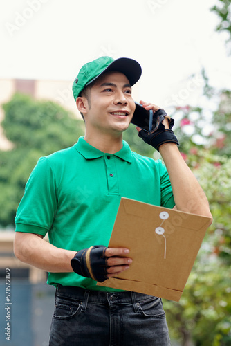 Delivery Man Talking on Phone