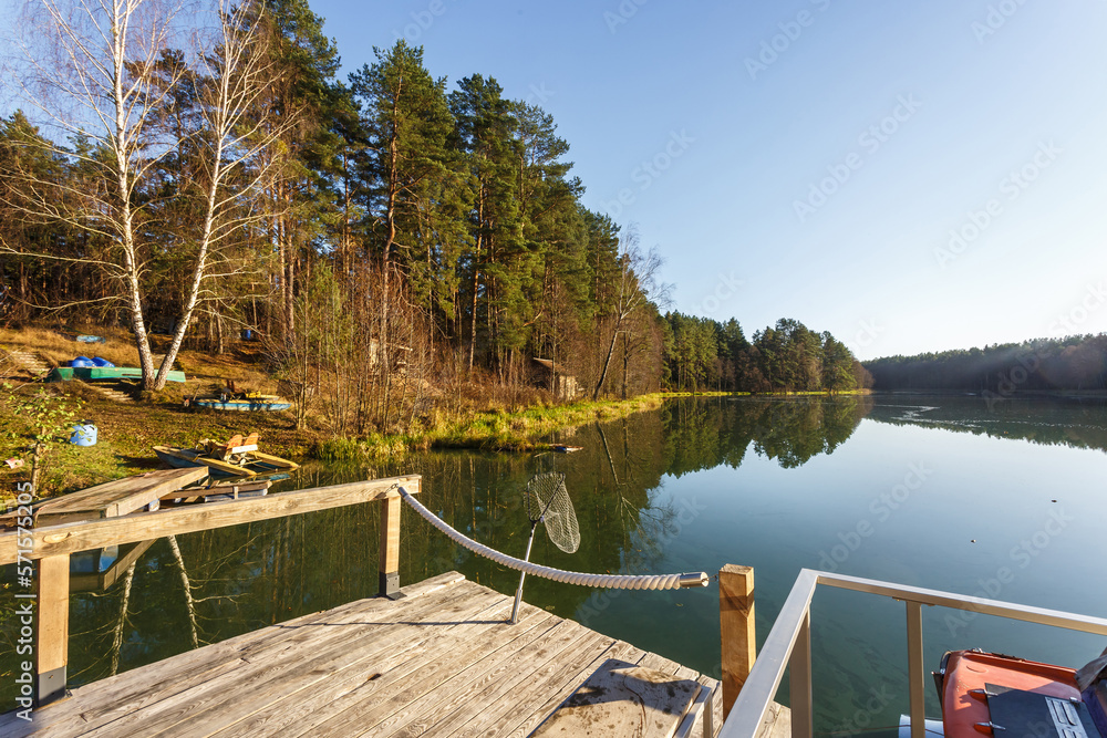 wooden house with piers on the lake. a place to relax from the hustle and bustle of the city wooden house with piers on the lake. a place to relax from the hustle and bustle of the city