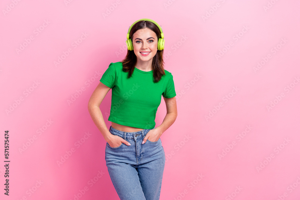 Photo of lovely positive lady toothy smile enjoy listen music headphones isolated on pink color background Photo of lovely positive lady toothy smile enjoy listen music headphones isolated on pink color background