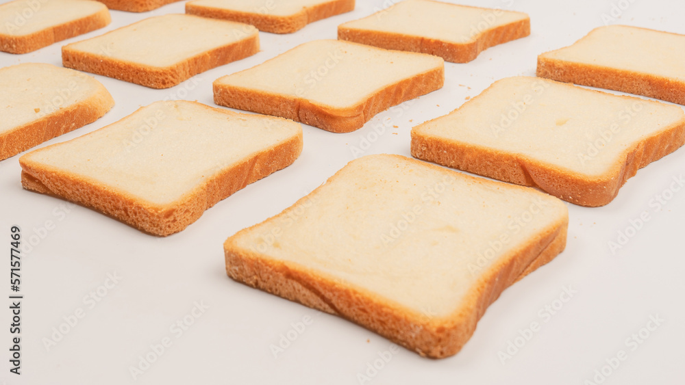 Delicious bread slices isolated on a white background, top view. Delicious bread slices isolated on a white background, top view.