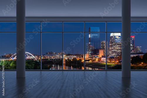 Downtown Nashville City Skyline Buildings from High Rise Window. Beautiful Expensive Real Estate overlooking. Epmty room Interior Skyscrapers View Cityscape. Night Tennessee. 3d rendering.