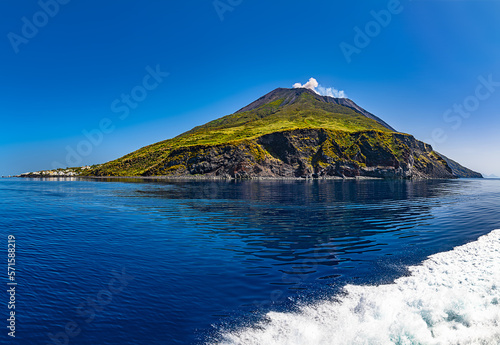 The vulcano island Stromboli in the blue sea north side photo