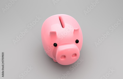 Piggy bank top angle on grey studio backdrop. Saving up while interest goes up.