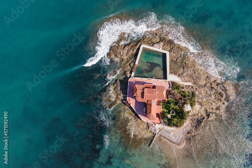 Aerial view of Isola Piccola, a building on a small island in Marzamemi, Pachino, Syracuse, Sicily, Italy. photo