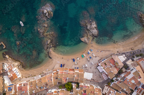 Aerial Top Down view of Playa de Malaspina Beach, Calella de Palafrugell, Costa Brava, Catalunya, Spain. photo