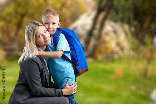 Young happy mother and child outdoors