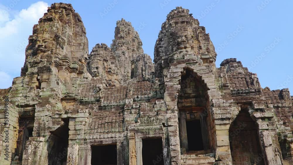 Ancient ruins Thom Bayon temple - famous Cambodian landmark, Angkor Wat complex of temples. Siem Reap, Cambodia. Ancient ruins Thom Bayon temple - famous Cambodian landmark, Angkor Wat complex of temples. Siem Reap, Cambodia.
