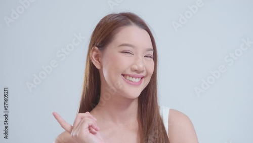 Portrait of beautiful asian woman over white background studio, skin care and beauty concept
