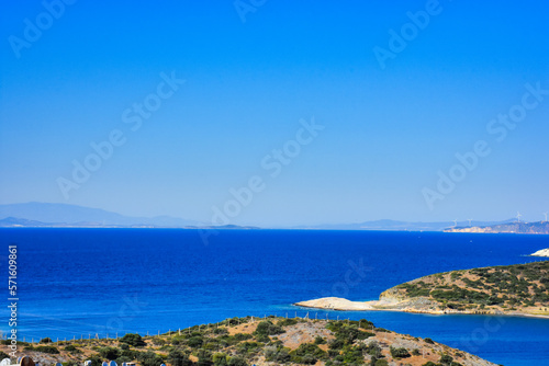 Fototapeta Naklejka Na Ścianę i Meble -  A virgin bay in İzmir Foça. Aegean sea, mountains and natural vegetation of the Aegean covered with maquis. Antique Phokaia in Izmir