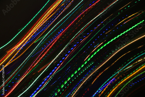 Abstract blurry background from colorful traces of lights