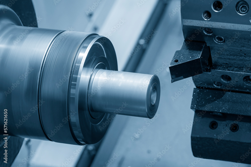The CNC lathe machine forming cutting the metal shaft parts. The CNC lathe machine forming cutting the metal shaft parts.