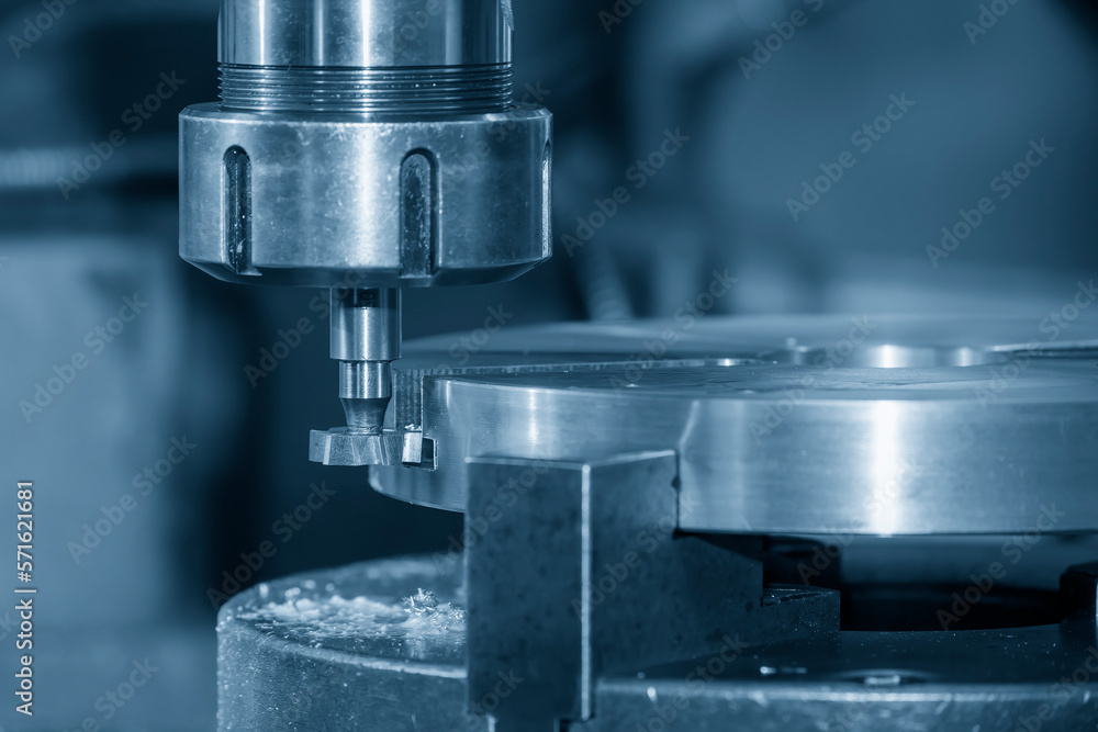 The NC milling machine T-slot cutting the metal parts. The NC milling machine T-slot cutting the metal parts.