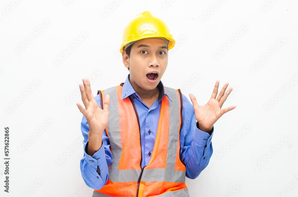 overjoyed asian male construction worker opening mouth shocked and surprised. construction worker with wow expression. overjoyed asian male construction worker opening mouth shocked and surprised. construction worker with wow expression.
