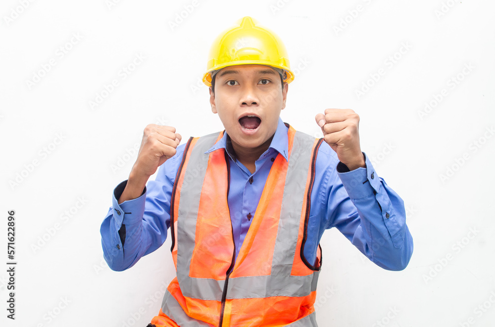 overjoyed asian male construction worker opening mouth shocked and surprised. construction worker with wow expression.