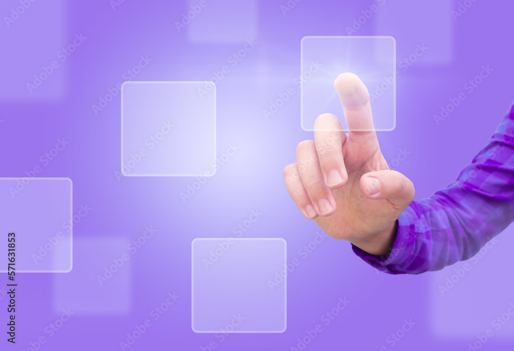 A female hand presses a holographic button A female hand presses a holographic button