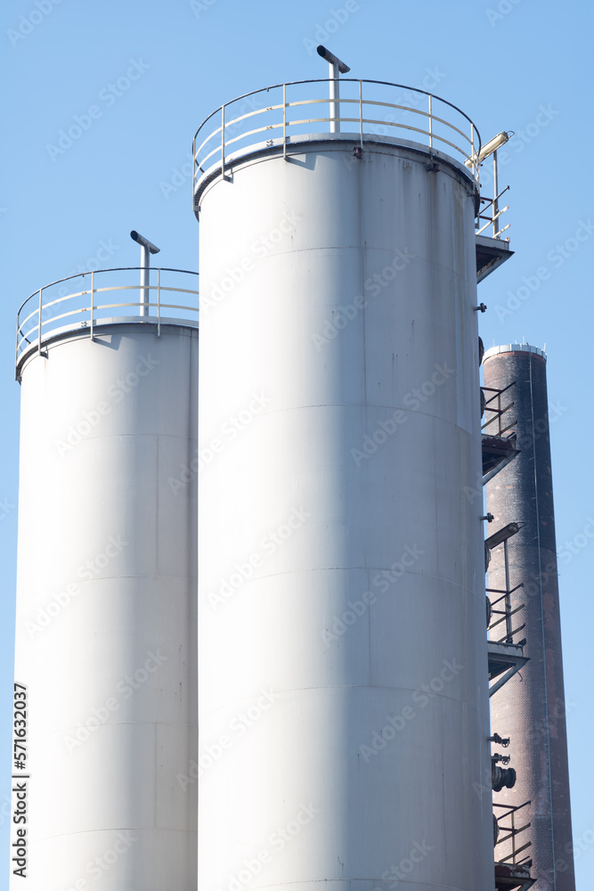 old refinery plant in the sun with blue sky