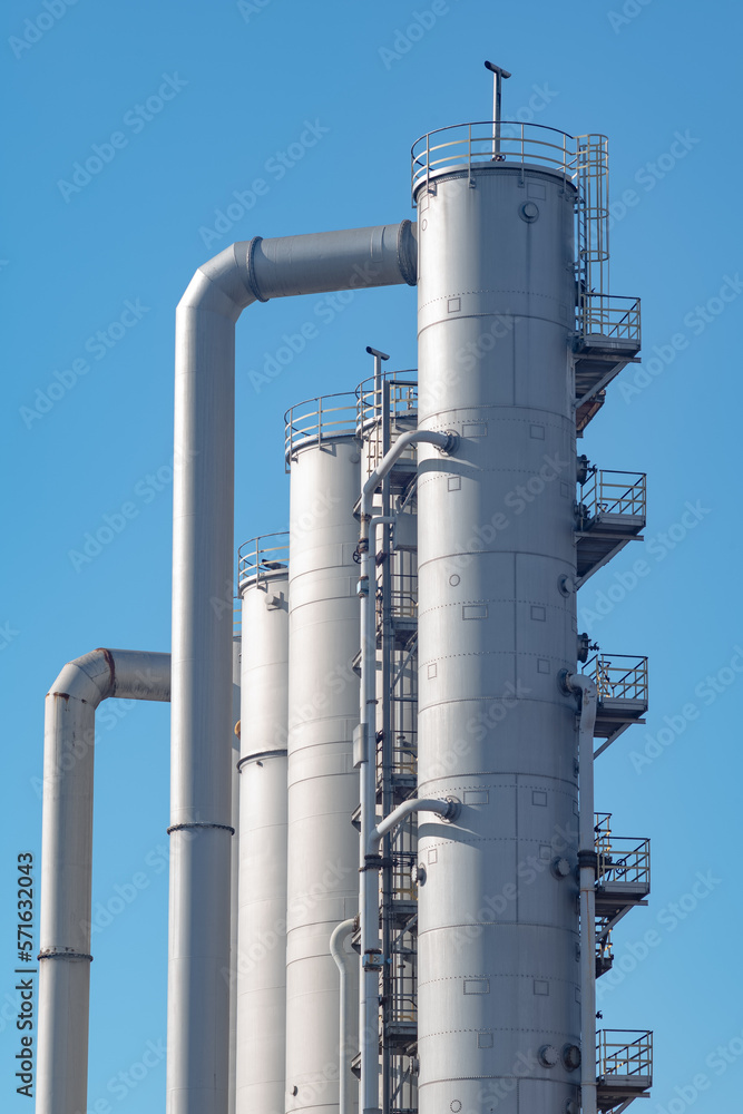 old refinery plant in the sun with blue sky