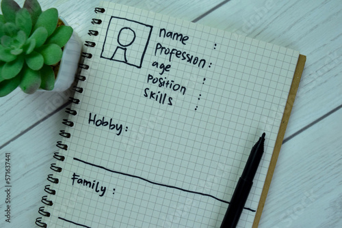 Concept of User's Persona write on book isolated on Wooden Table. photo