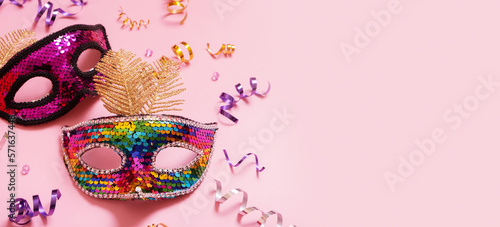 Festive masquerade or carnival background with festive masks with copy space