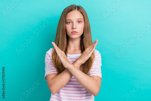Photo of serious confident lady wear striped t-shirt arms crossed asking stop isolated turquoise color background