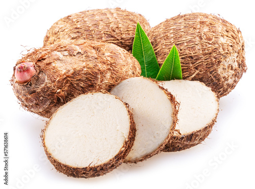Eddoe or taro tubers and its slices isolated on white background.