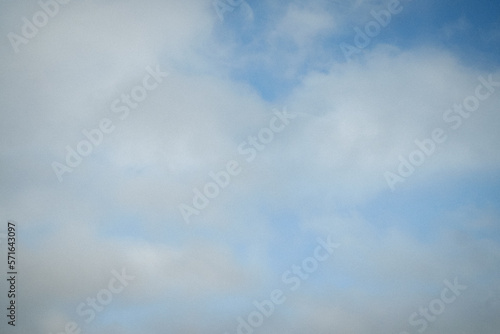 Soft white clouds on a light blue sky