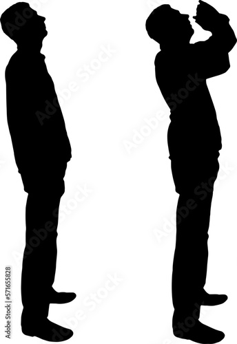 The man looks up and calls standing in profile. Business Concep