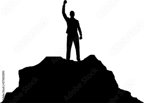 Silhouette of a happy climber at the top of the mountain with his hand raised. Business concept of success and victory