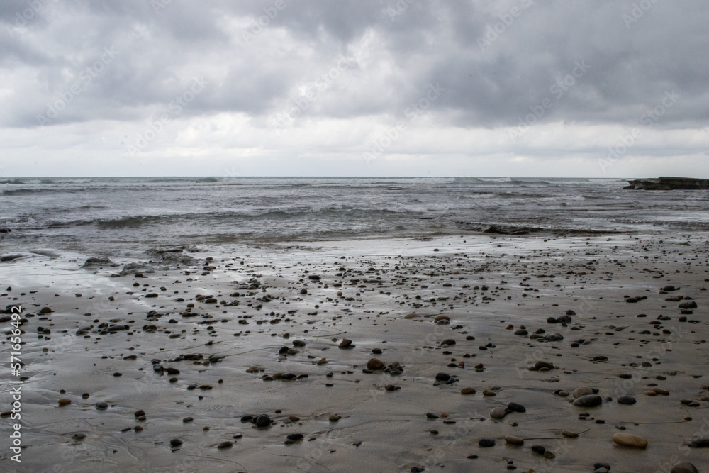 Cloudy beach shore coastline waves Cloudy beach shore coastline waves