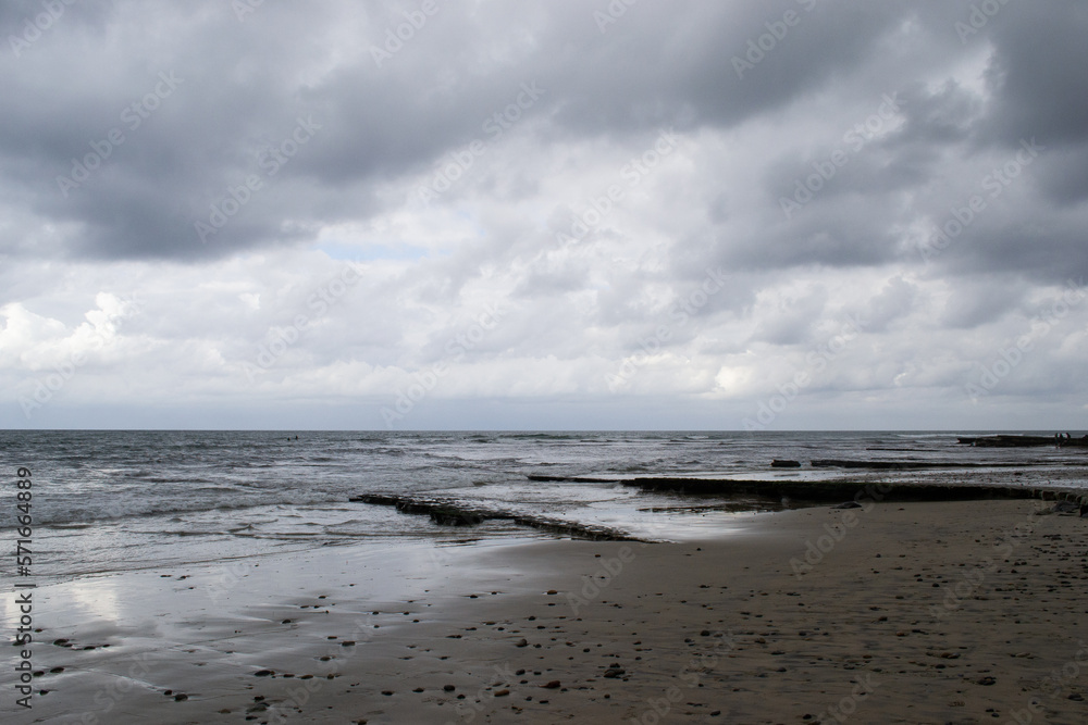 Cloudy beach shore coastline waves Cloudy beach shore coastline waves