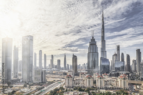 DUBAI, UAE - CIRCA 2022: High key panorama of down town Dubai modern city on a cloudy day