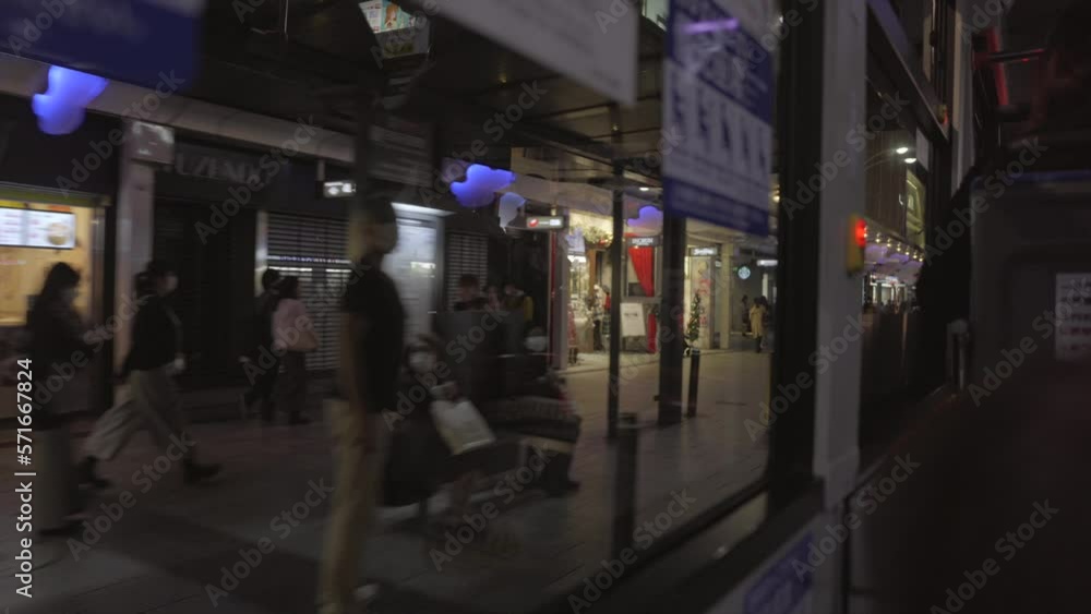 This video shows a passenger POV of looking out a bus window in the evening. This video shows a passenger POV of looking out a bus window in the evening.