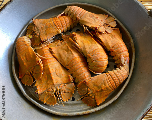 Flathead lobster, thenus orientalis, oriental flathead lobster, theninae, lobster moreton, thenus,  is a very delicious seafood. can be found in fish markets in tropical countries photo