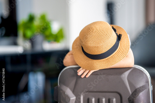 Little girl with suitcase baggage luggage ready to go for traveling on vacation