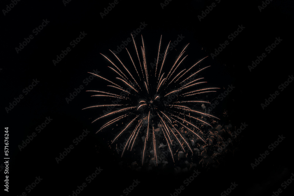 Beautiful abstract pattern with salute fireworks on dark background. 