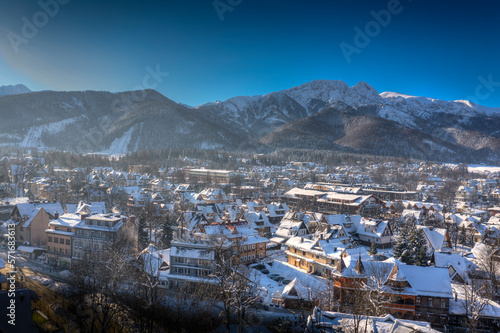 Winter panorama of Zakopane City.  On the background  Tatra Mountains with Giewont Peak. Tatras, Poland.. © ysuel